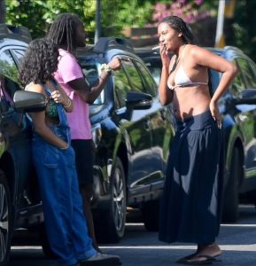 Sasha Obama Spotted Out Smoking Cigarette In Bathing Suit