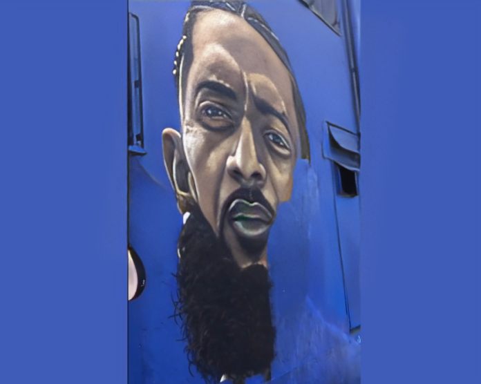 Cowboy Protects Nipsey Hussle's Mural from Vandalism by Repainting It in LA